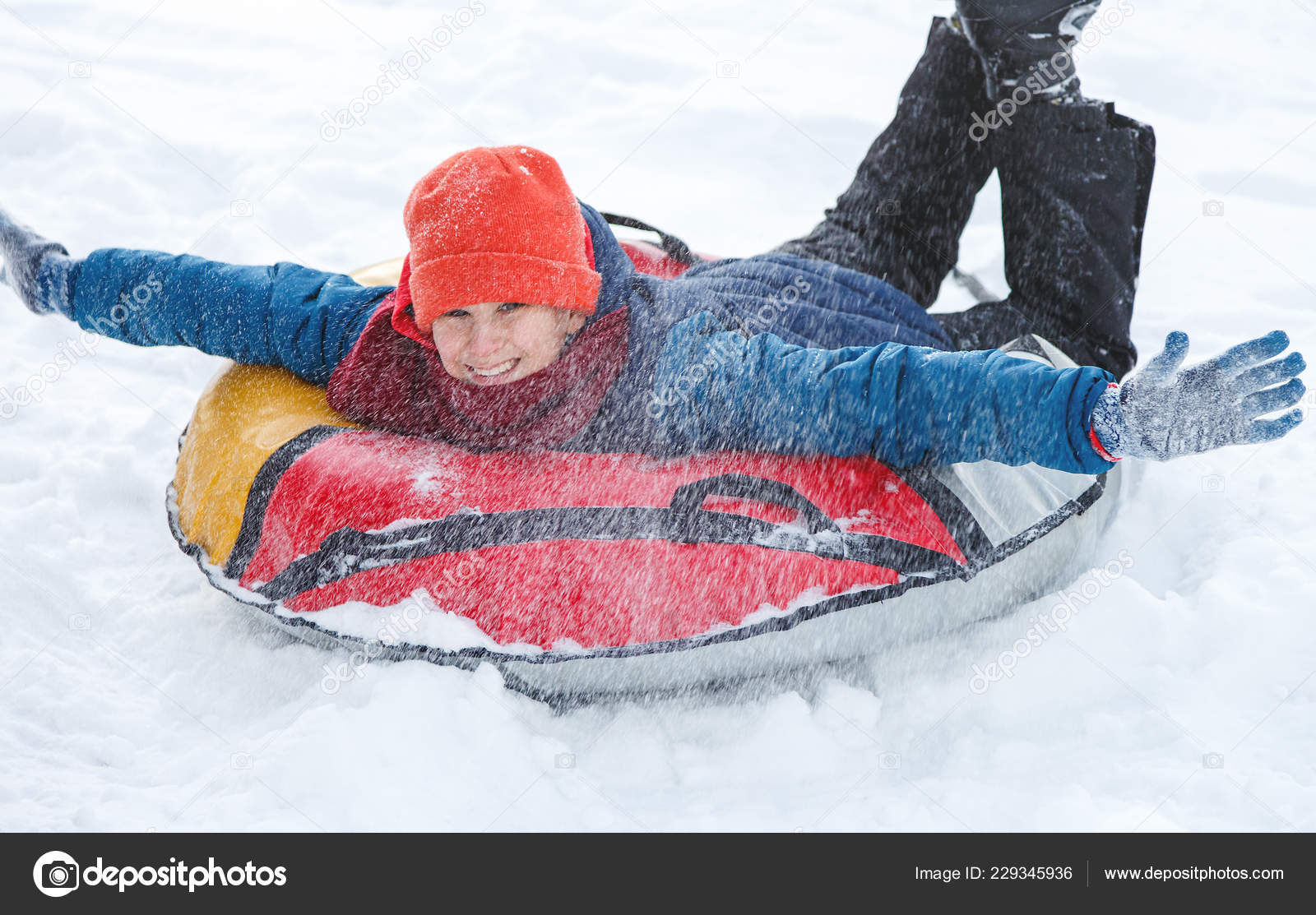 Theory of relativity Dislike solely Handsome Teen Laughing Showing Excitement While Slides Downhill Snow Tubing  Stock Photo by ©chekyravaa 229345936