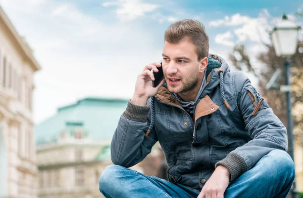Man Speaking Phone While Sitting Serious Guy Phone Outdoor — Stock Photo, Image