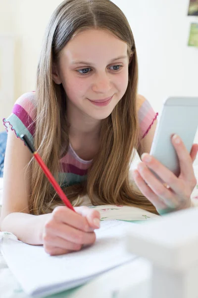 Girl Lying Bed Using Mobile Phone Help Homework — Stock Photo, Image