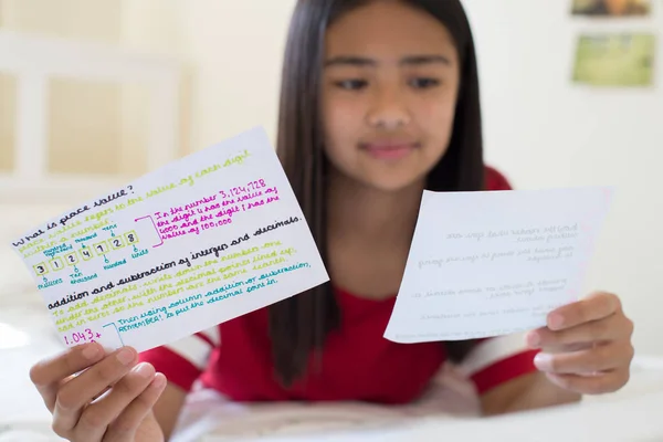 Girl Lying Bed Using Written Study Cards Help Revision — Stockfoto