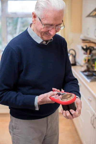 Senior Man Kitchen Taking Lid Jar Kitchen Aid — Stock Photo, Image