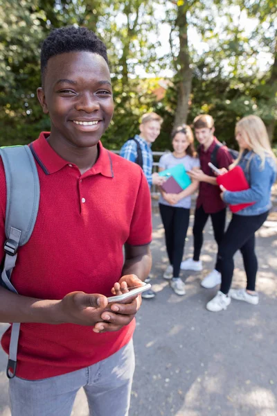 Portrait Male Teenage High School Student Outdoors Friends Holding Mobile — Stock Photo, Image