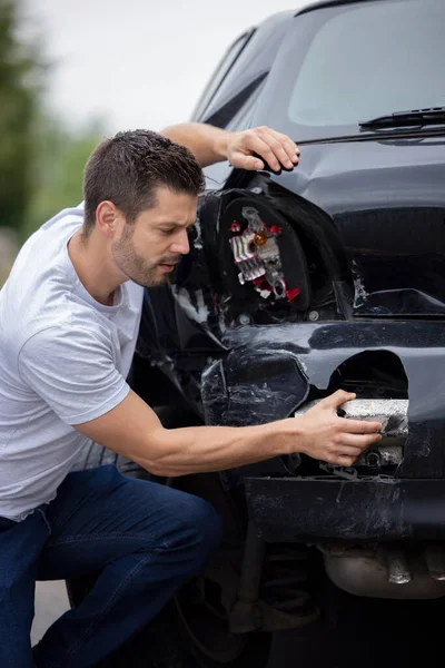 Unhappy Male Driver Inspecting Damaged Car Accident — Stock Photo, Image