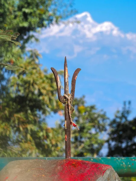 Trident at Kali Temple above stone, Kali Shrine on the mountain at Dhulikhel in Nepal — Stock Photo, Image