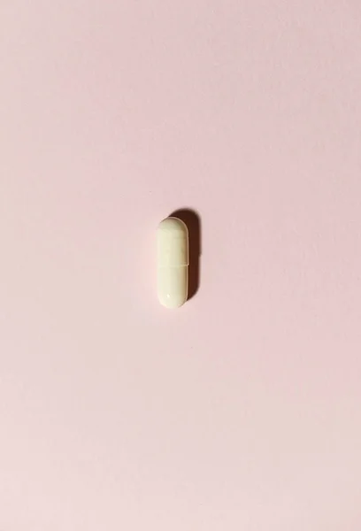 One White Pill Orange Background Minimalist Concept Medicine — Stock Photo, Image