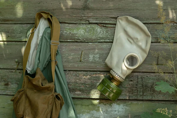 Gas mask - a piece of clothing that protects the respiratory tract. It has a creepy appearance, but necessary in emergency situations.