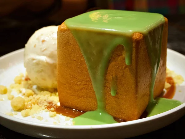 A toast with pandan filling eat with crumble and ice-cream. Such a perfect match of dessert