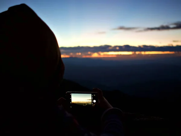 A smartphone screen that shot the first light of the dawn in the morning