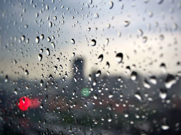 Rain Drops Glass Blur Cityscape Bokeh Light — Stock Photo, Image