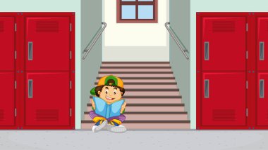 Okul merdiveninde kitap okuyan çocuk