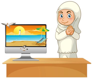 Sahili ekranda olan bilgisayarın yanındaki Müslüman kız.