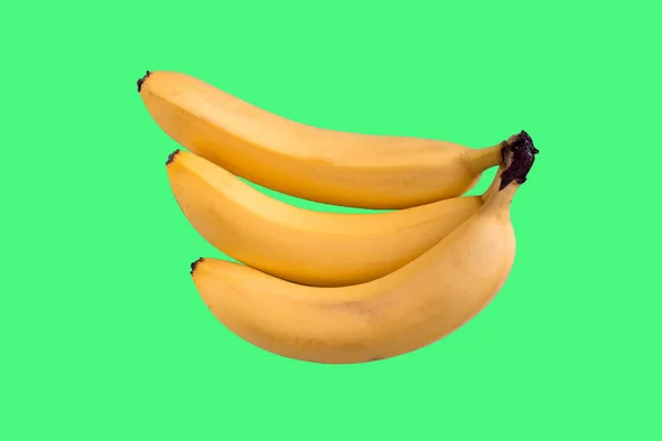 Bananas Amarelas Isoladas Fundo Verde — Fotografia de Stock