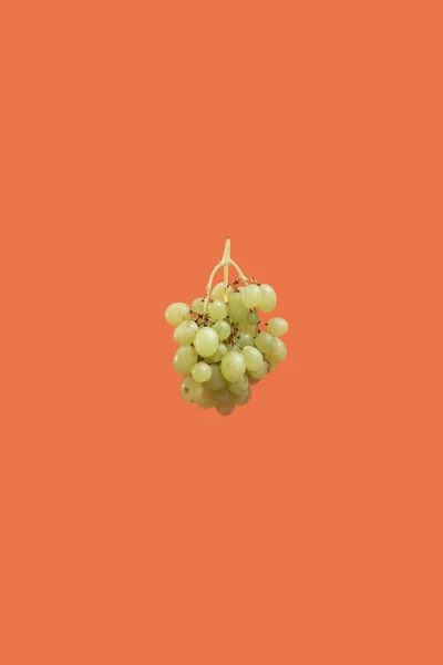 Green Grape Bunch Floating Orange Background — Stock Photo, Image