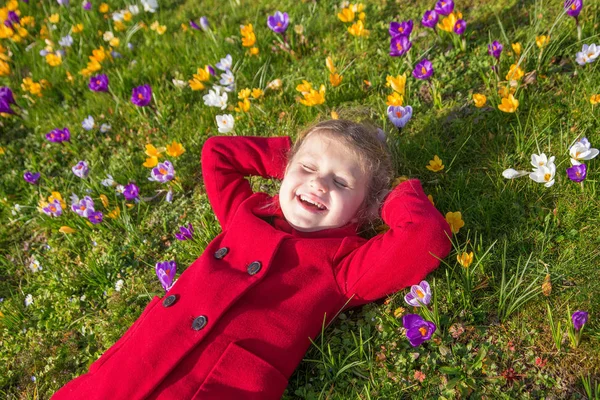 Child Enjoys Spring Sun Flowers Smiling Kid Lying Green Grass — Stock Photo, Image