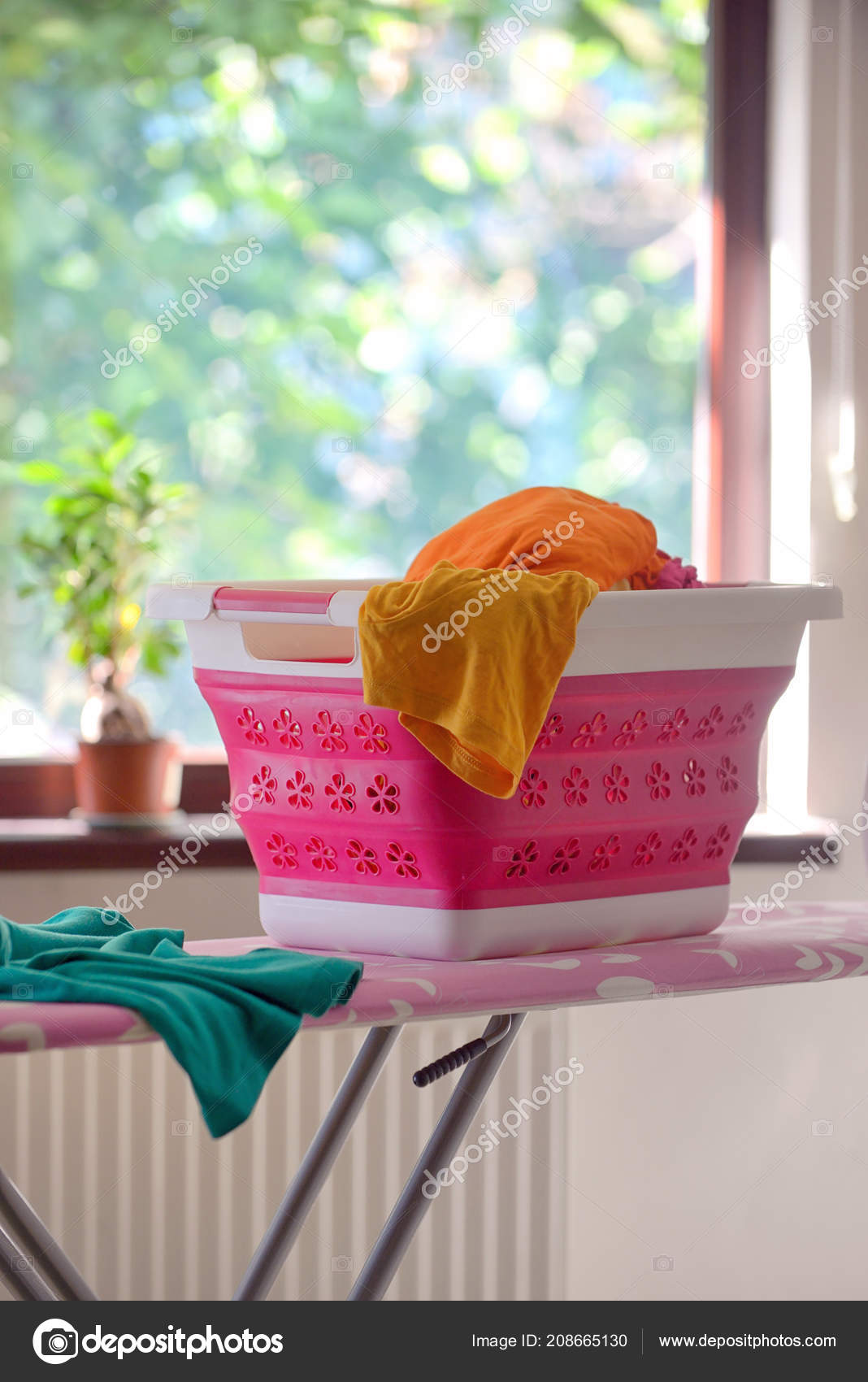 Collapsible Silicone Laundry Basket House Stock Photo by ©mady70 208665130