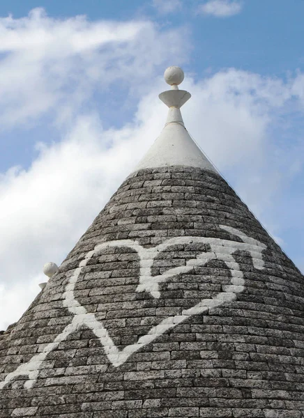 Alberobello, Puglia Region, South of Italy. Trulli di Alberobello.  Traditional roofs of the Trulli, original and old houses of this region. UNESCO heritage site.