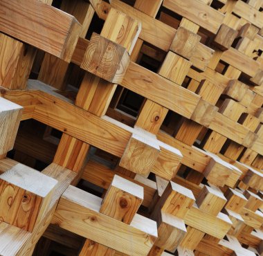 Tahta bloklar kolaj arka planda kesintisiz dokusuna. 3d etkisi ile tekrarlanan haçlar.