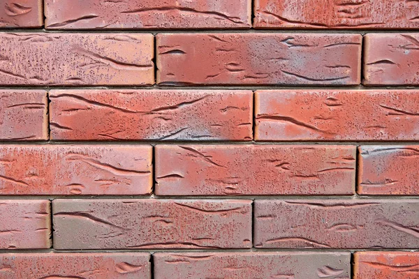 red textured bricks close-up, brick wall