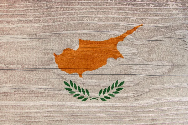 The Cyprus flag with a tree structure. Cyprus flag on wooden texture