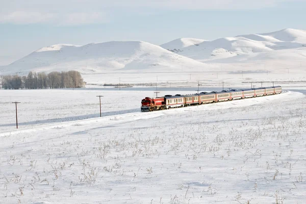 East express train and snow road