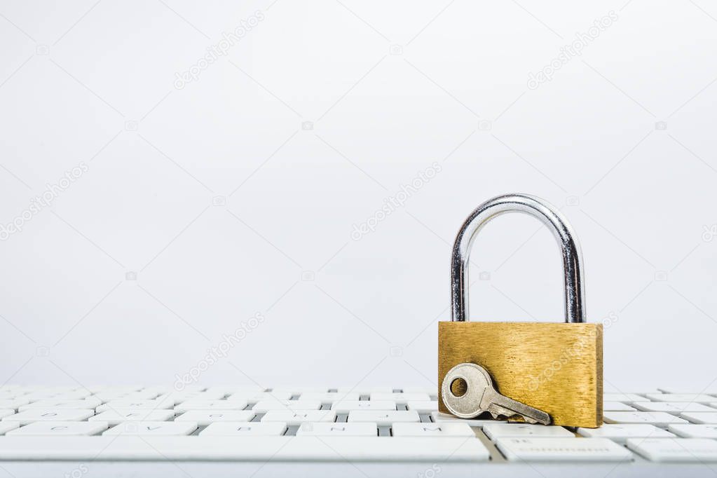 Background image of metal lock on keyboard
