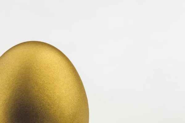 Μέρος της το χρυσό αυγό που απομονώνονται σε λευκό φόντο — Φωτογραφία Αρχείου