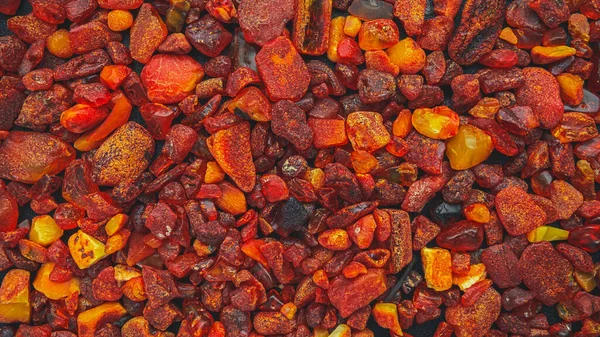 Amber stenen natuurlijke achtergrond patroon, plat lay — Stockfoto