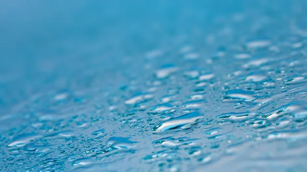 Gotas de agua en el vidrio, concepto de lluvia — Foto de Stock