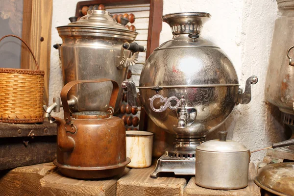 Old kitchen utensils, placed on a mantelpiece