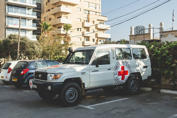 Tel Aviv / Israel-13/10/18: white Toyota Land Cruiser station wagon that belongs to the International Committee of the Red Cross on a car parking in Tel Aviv