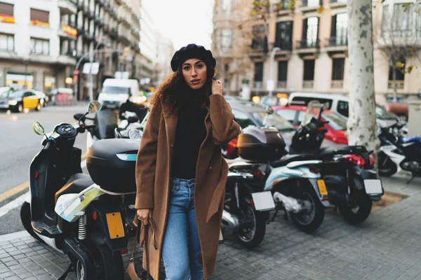 Portrait Pensive Caucasian Female Dark Curly Hair Wearing Coat Jeans — Stock Photo, Image