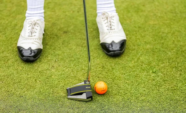 Golf putter, golf ball, Fireway on green hole — Stock Photo, Image