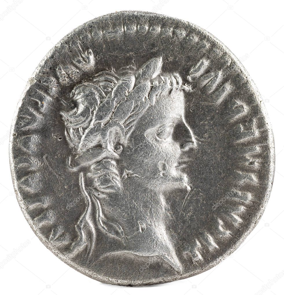 Ancient Roman silver denarius coin of Emperor Tiberius. Obverse.