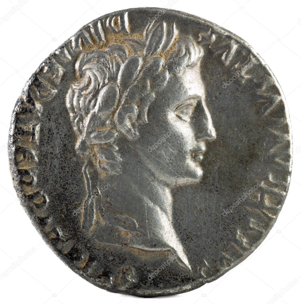 Ancient Roman silver denarius coin of Emperor Augustus. Obverse.