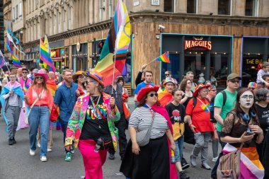 Glasgow 'un Onur Madalyası 19 Temmuz 2025. Glasgow, İskoçya sokaklarında. Kelvingrove Park 'tan başlayarak şehir merkezine gitti ve Barrowland Park' ta LGBTQ + insanları desteklemek için bitirdi..