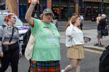 Glasgow 'un Onur Madalyası 19 Temmuz 2025. Glasgow, İskoçya sokaklarında. Kelvingrove Park 'tan başlayarak şehir merkezine gitti ve Barrowland Park' ta LGBTQ + insanları desteklemek için bitirdi. 