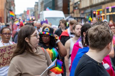 Glasgow 'un Onur Madalyası 19 Temmuz 2025. Glasgow, İskoçya sokaklarında. Kelvingrove Park 'tan başlayarak şehir merkezine gitti ve Barrowland Park' ta LGBTQ + insanları desteklemek için bitirdi..
