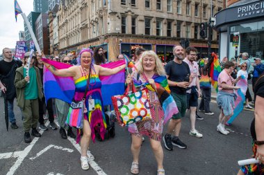 Glasgow 'un Onur Madalyası 19 Temmuz 2025. Glasgow, İskoçya sokaklarında. Kelvingrove Park 'tan başlayarak şehir merkezine gitti ve Barrowland Park' ta LGBTQ + insanları desteklemek için bitirdi. 
