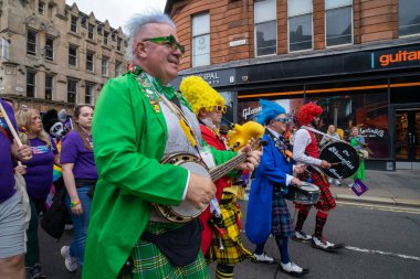 Glasgow 'un Onur Madalyası 19 Temmuz 2025. Glasgow, İskoçya sokaklarında. Kelvingrove Park 'tan başlayarak şehir merkezine gitti ve Barrowland Park' ta LGBTQ + insanları desteklemek için bitirdi..