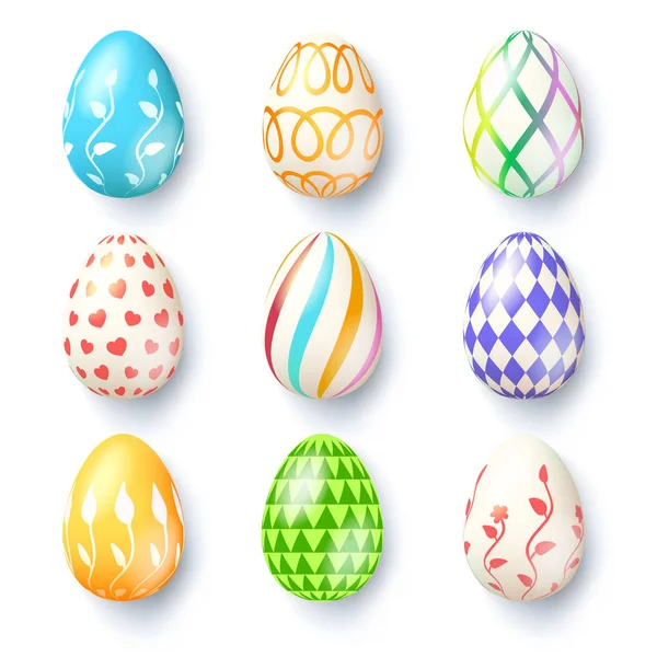 Felices fiestas de Pascua. Colección de huevos de Pascua hechos a mano con diferentes pinturas. Conjunto de huevos de Pascua aislados sobre fondo blanco. Iconos realistas para vacaciones de primavera . — Vector de stock