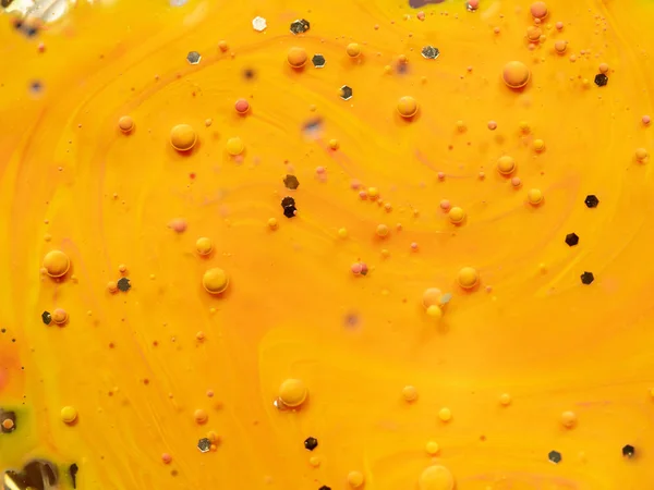 Pattern of multicolour spheres and hexagons on abstract background. Close up macro shot. Blurred background. Selective soft focus. Abstract orange universe. Colourful space of bubbles. — ストック写真