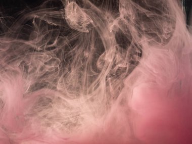 Pembe akrilik boya suya eriterek, soyut desen. Yakından görüş. Bulanık soyut arka plan. Mürekkep sıvıya düştü. Su ile karıştırma boya. Su altında akrilik duman. Soyut sanat.