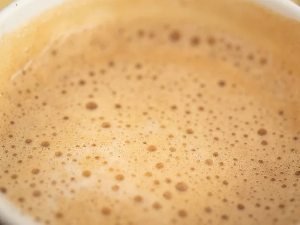 Текстура кофейной пены. Вид сверху крупным планом — стоковое фото