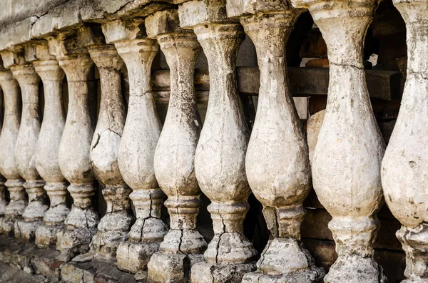 row of antique small columns