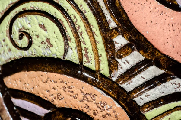 abstract pattern of a painted clay vase macro