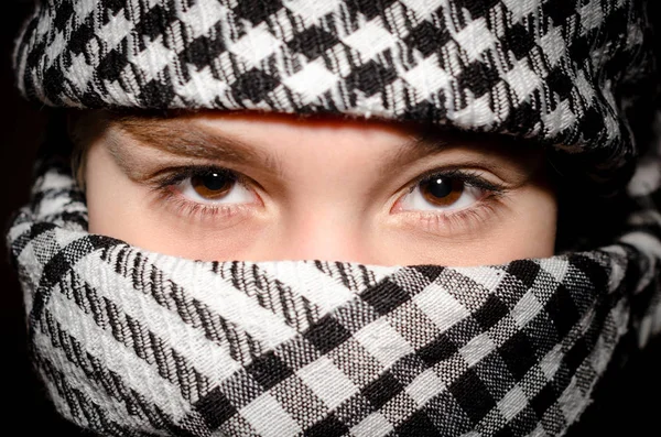 Brown eyes of a young girl in arabic clothes closeup — Stock Photo, Image