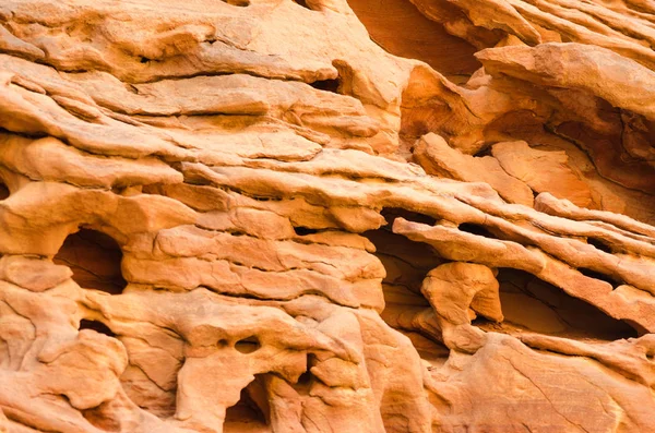 Texture of orange stone rock in a colored canyon close up — Stock Photo, Image