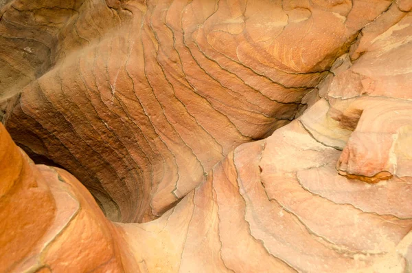 Textura de rocha de pedra laranja em um cânion colorido de perto — Fotografia de Stock