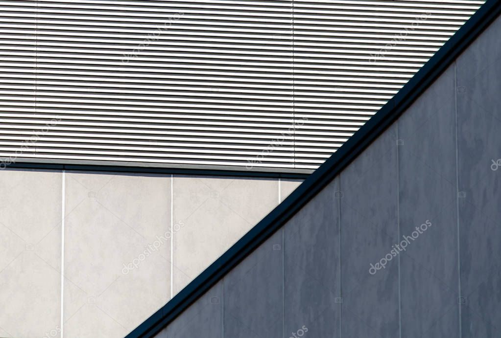 architectural abstract background of a striped wall and concrete