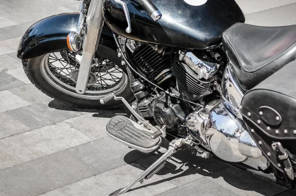 Shiny motorcycle chopper on the road close up — Stock Photo, Image